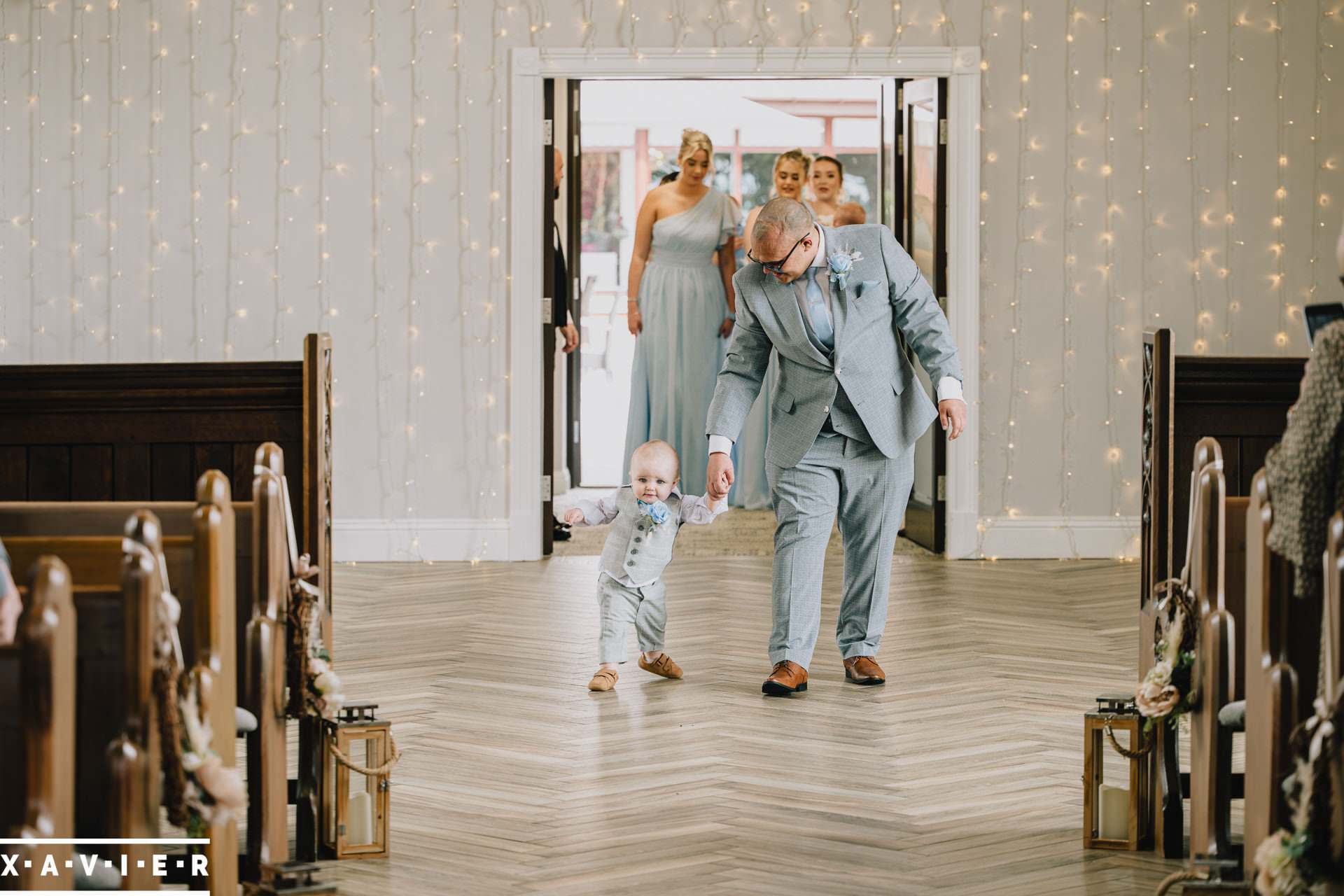 page boy walking up the aisle