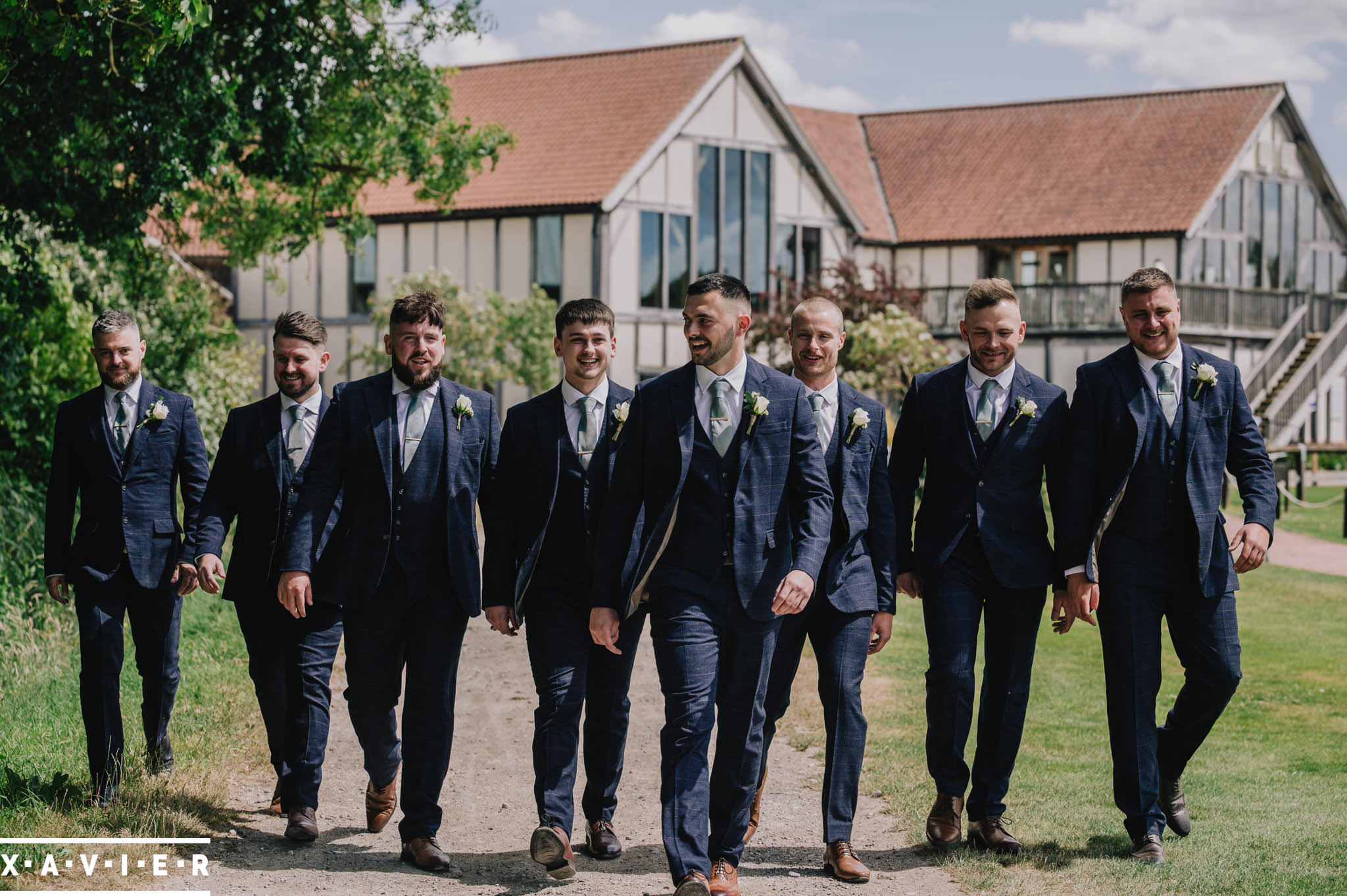 groomsmen walking in a line