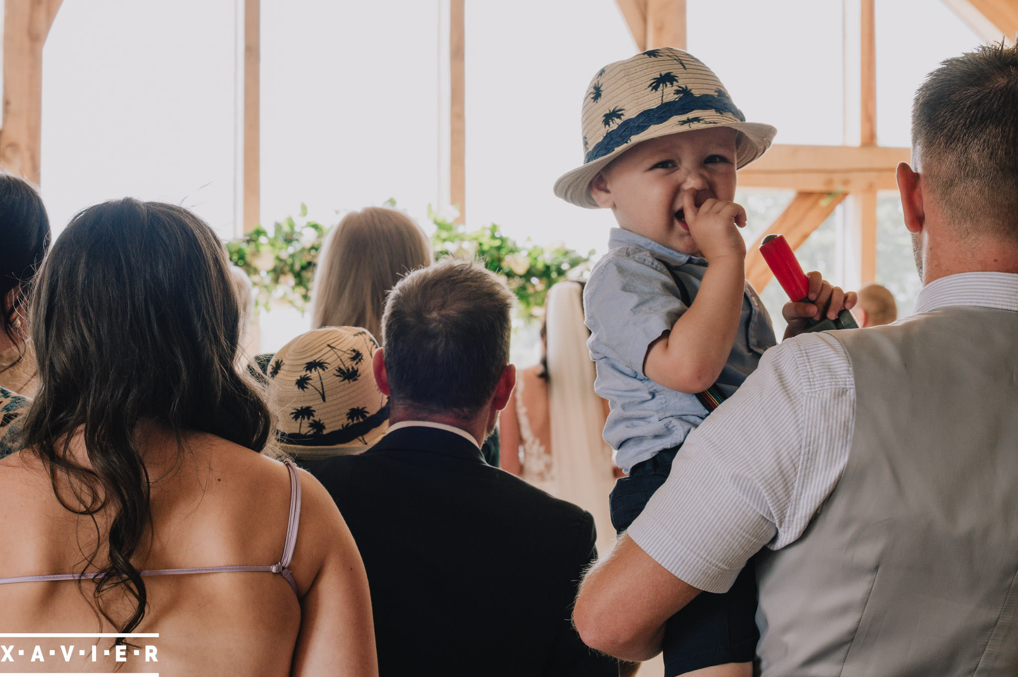 child picking his nose during the ceremony