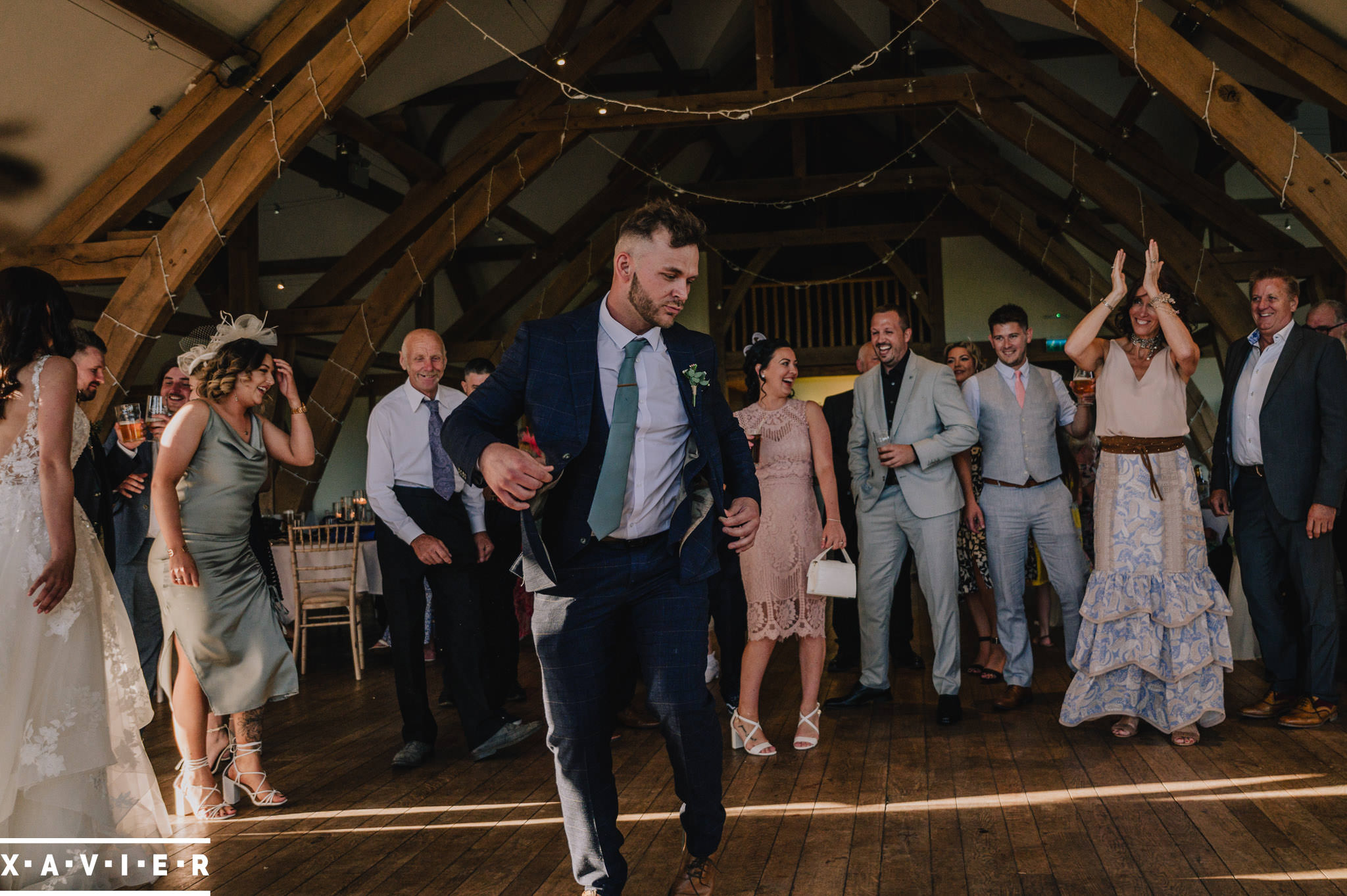 lone wedding guest on the dance floor