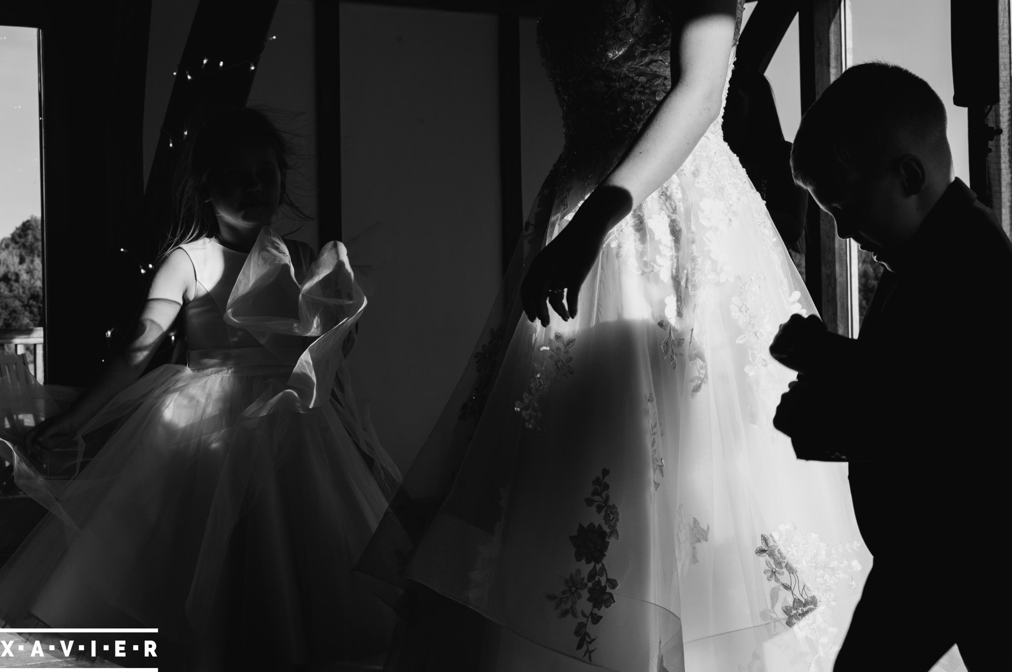 brides children dance around her