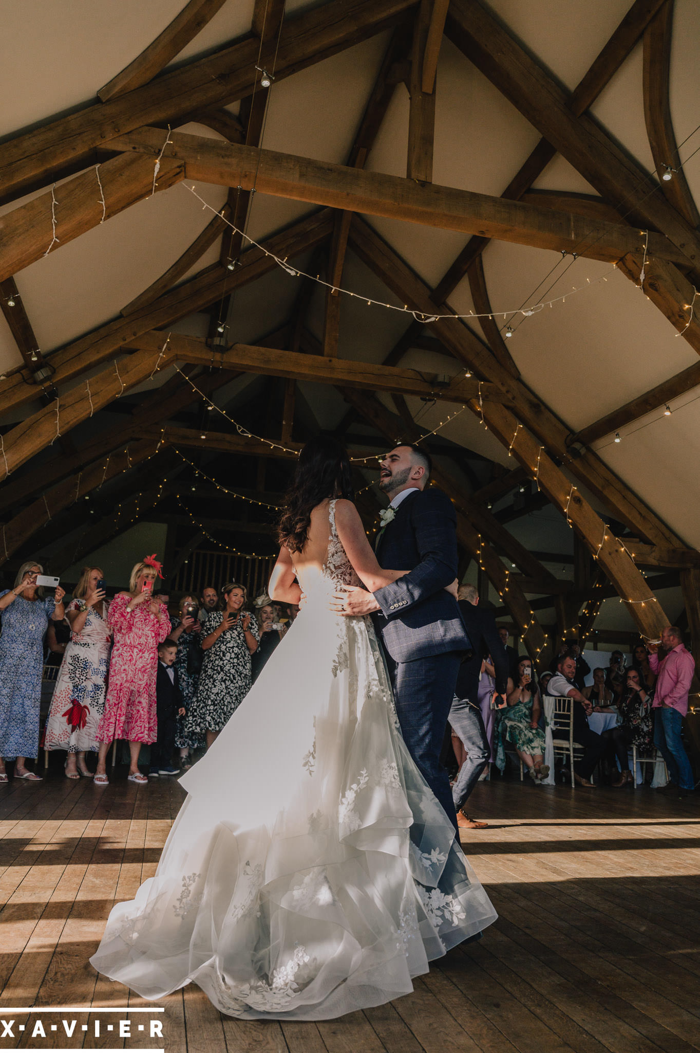 bride and groom having their first dance