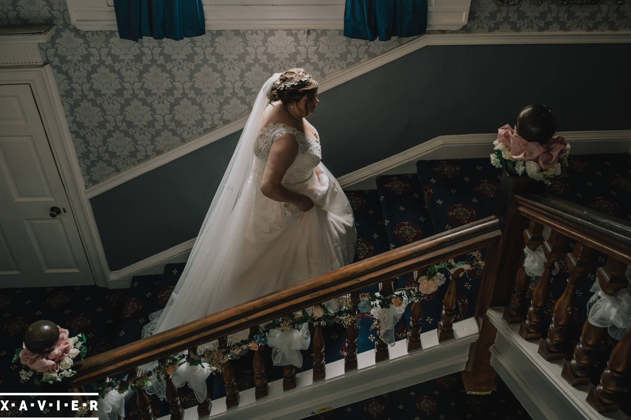 bride walks up the stairs