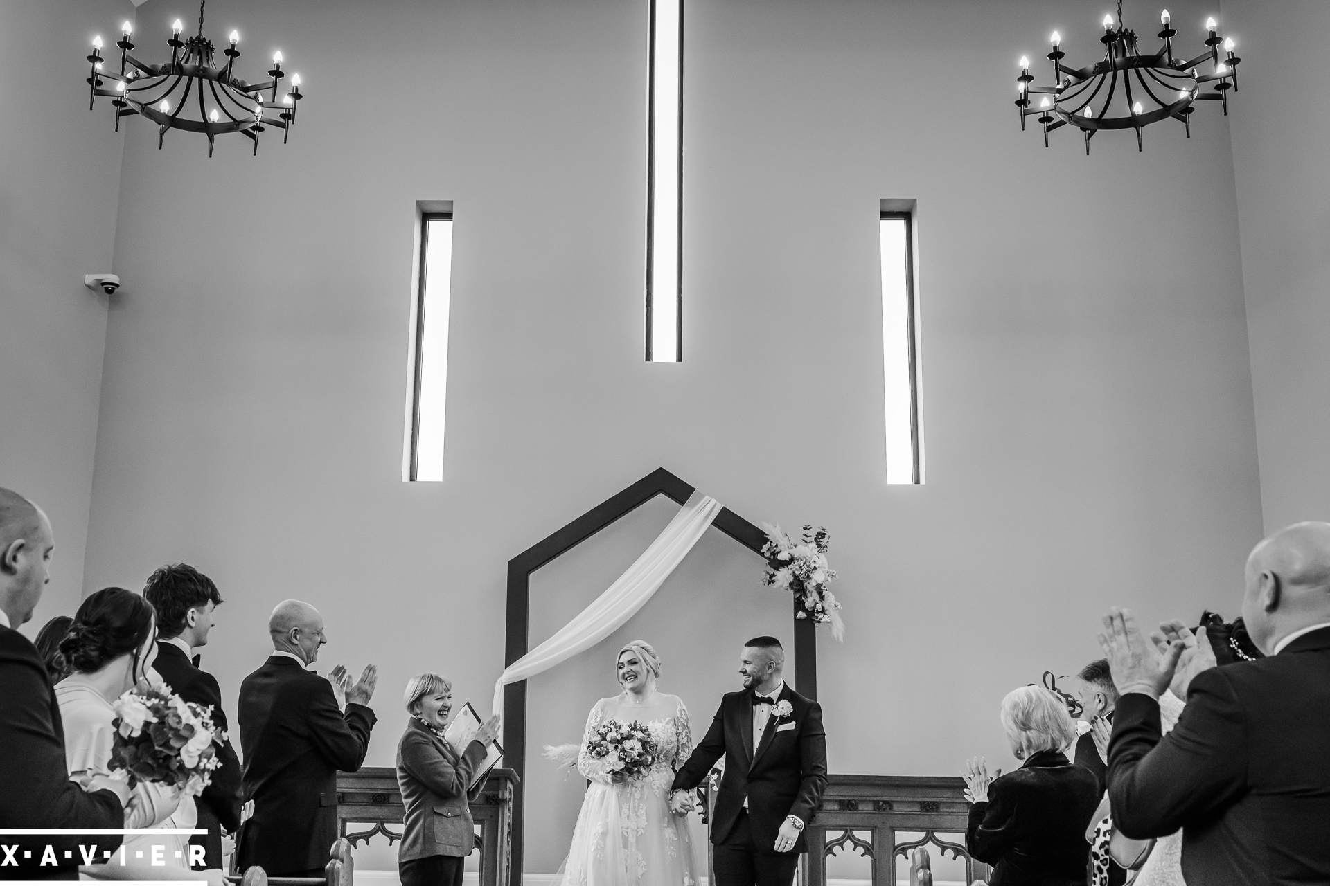 bride and groom at the altar