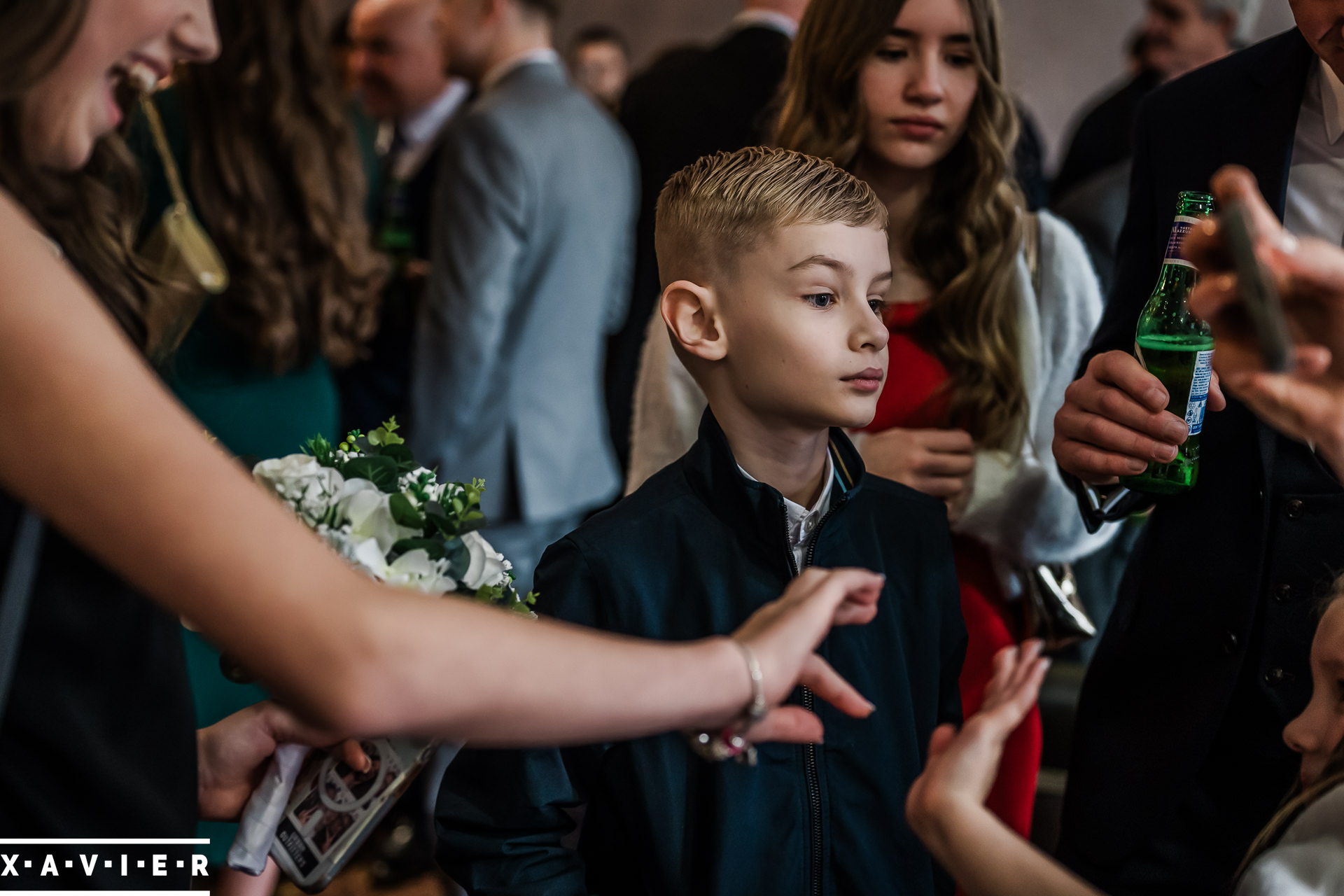Candid moment of young guest during the wedding reception