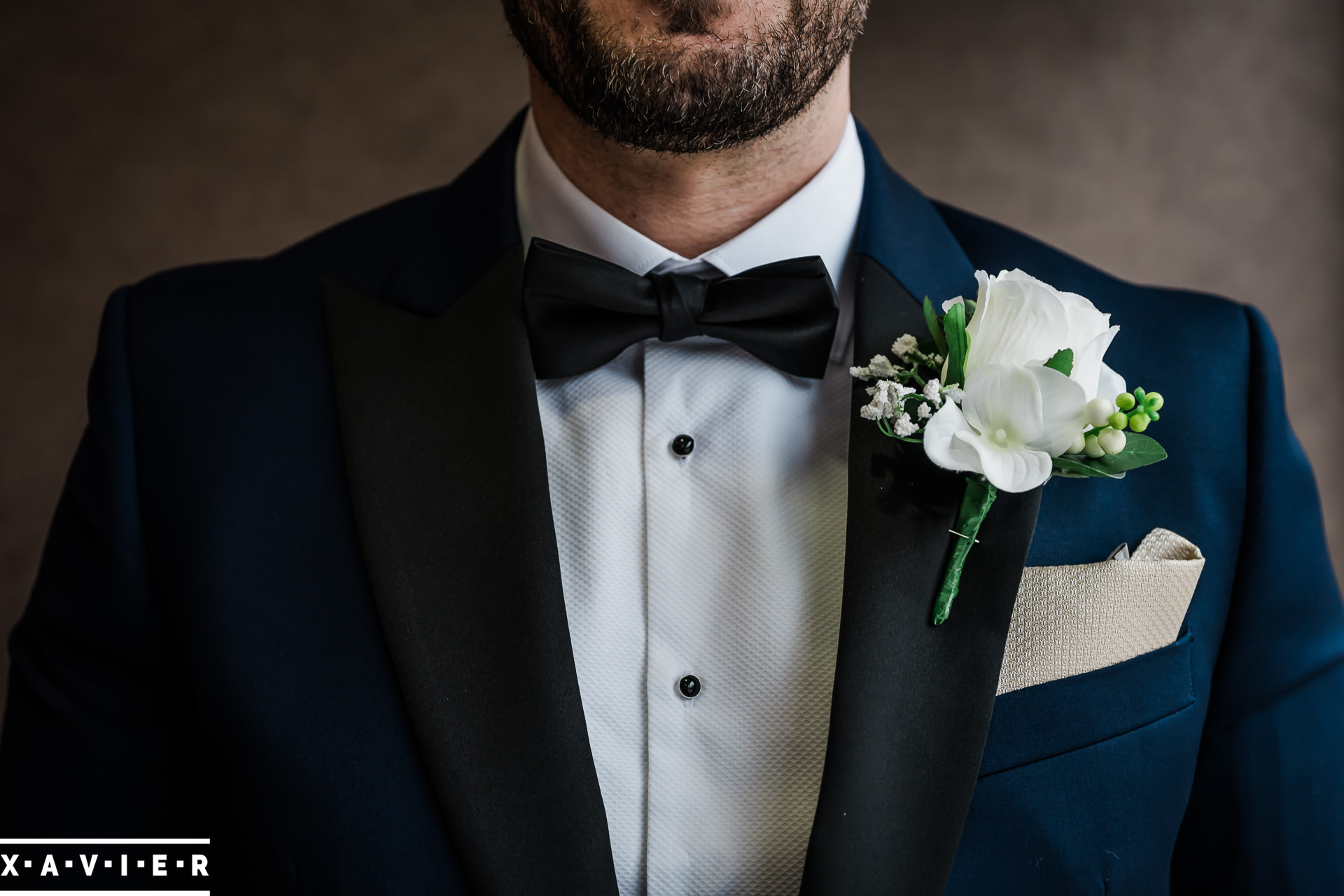 close up of groom's attaire