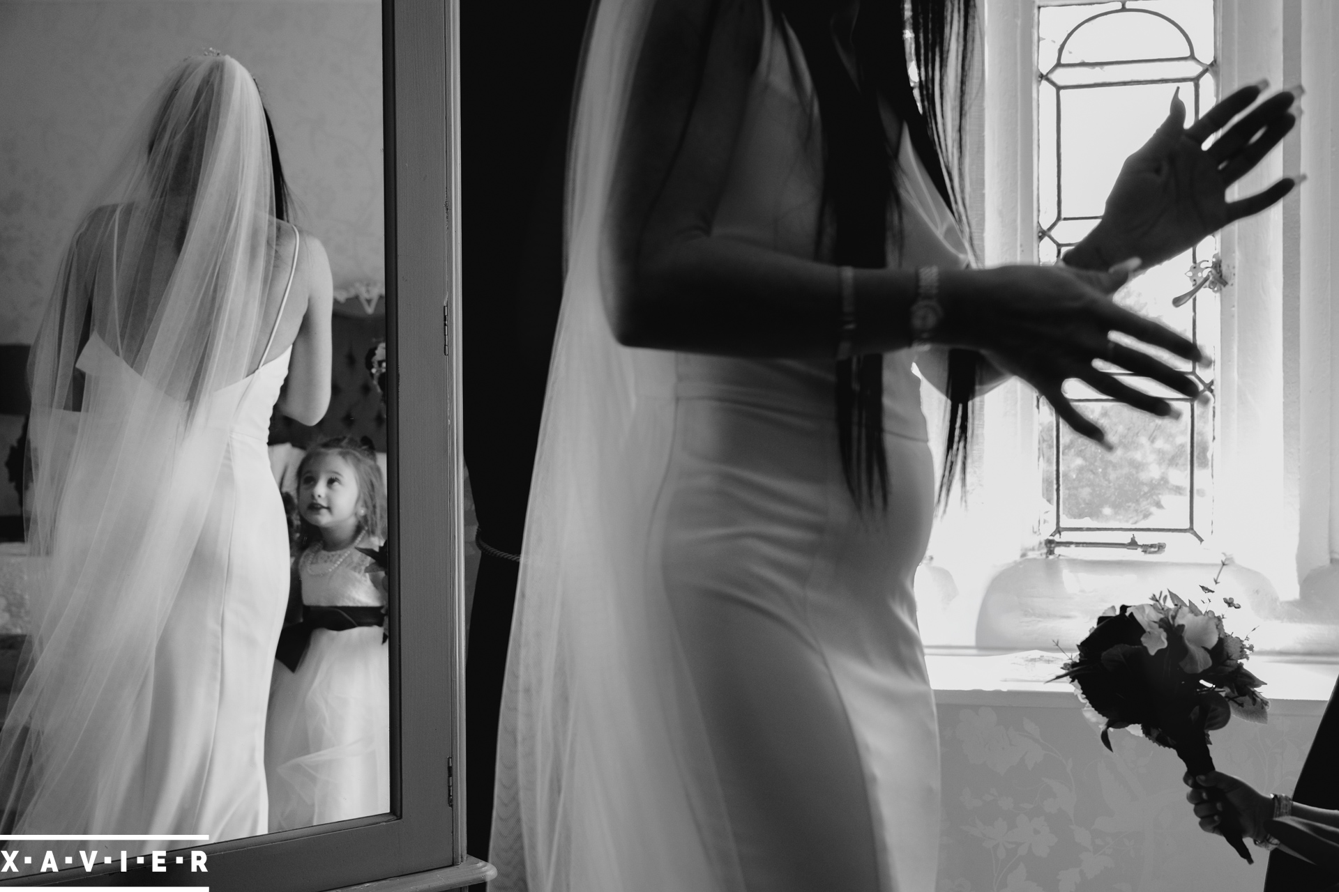 flower-girl-holds-out-flowers-to-the-bride