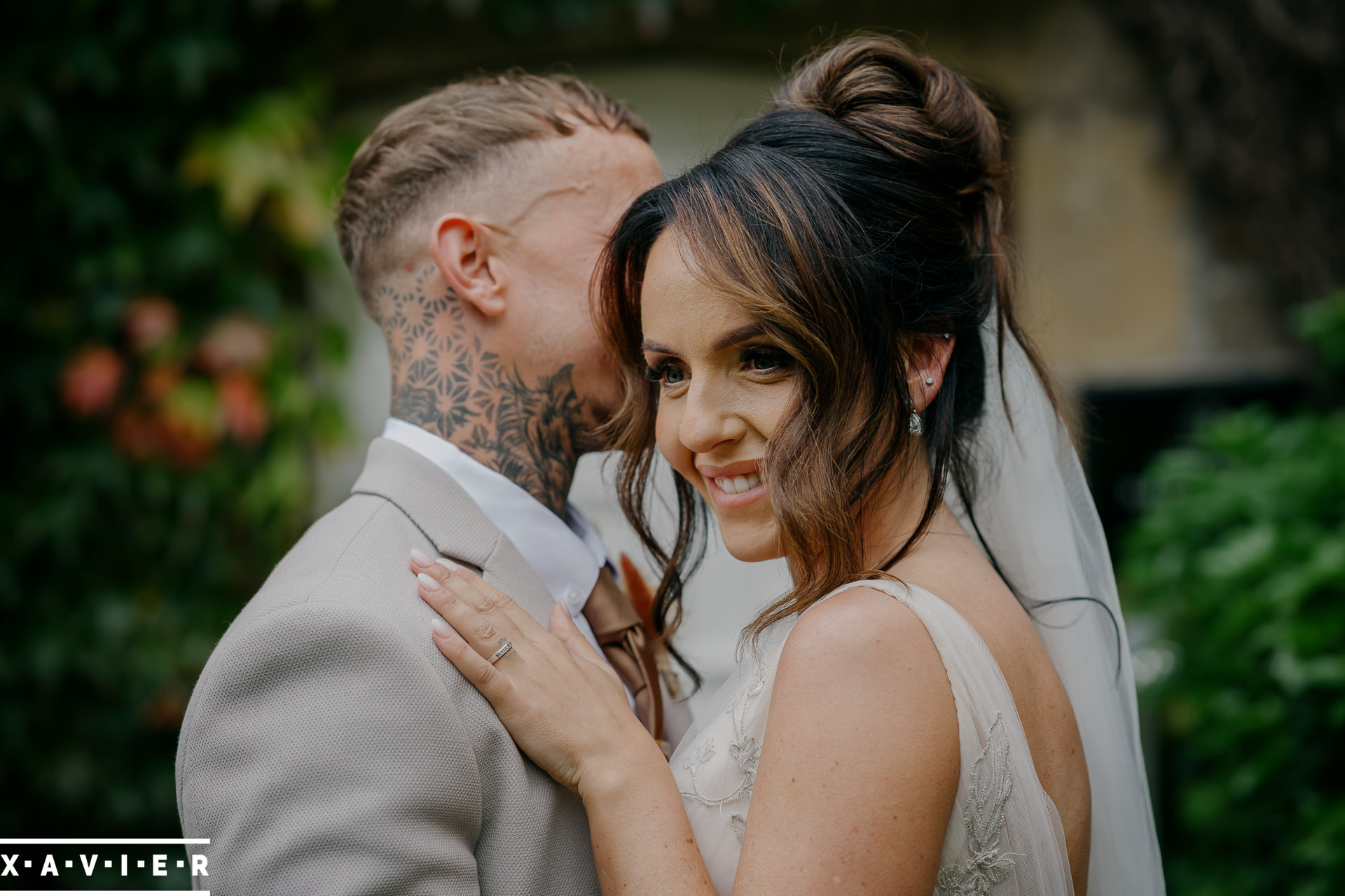bride and groom holding each other