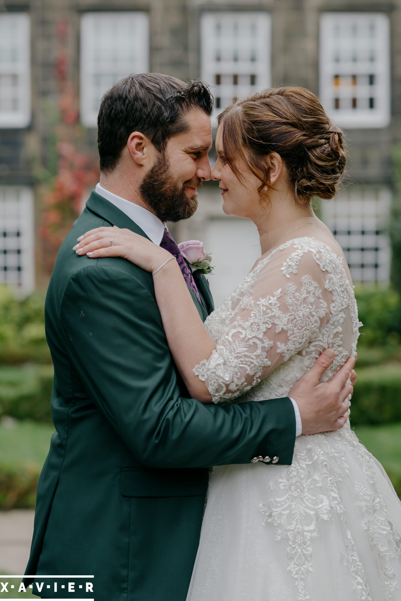 bride and groom holding each other