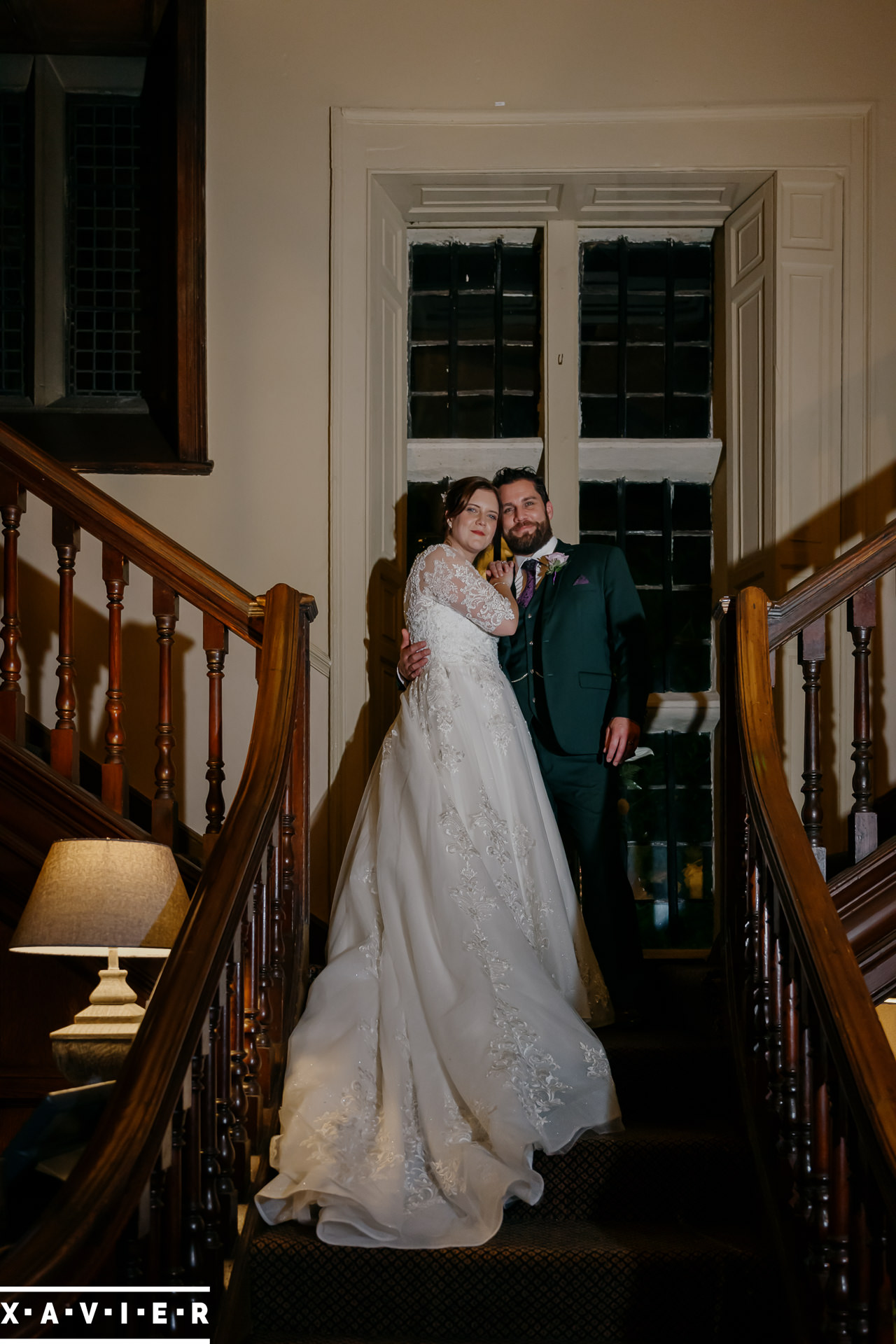 bride and groom on the stairs
