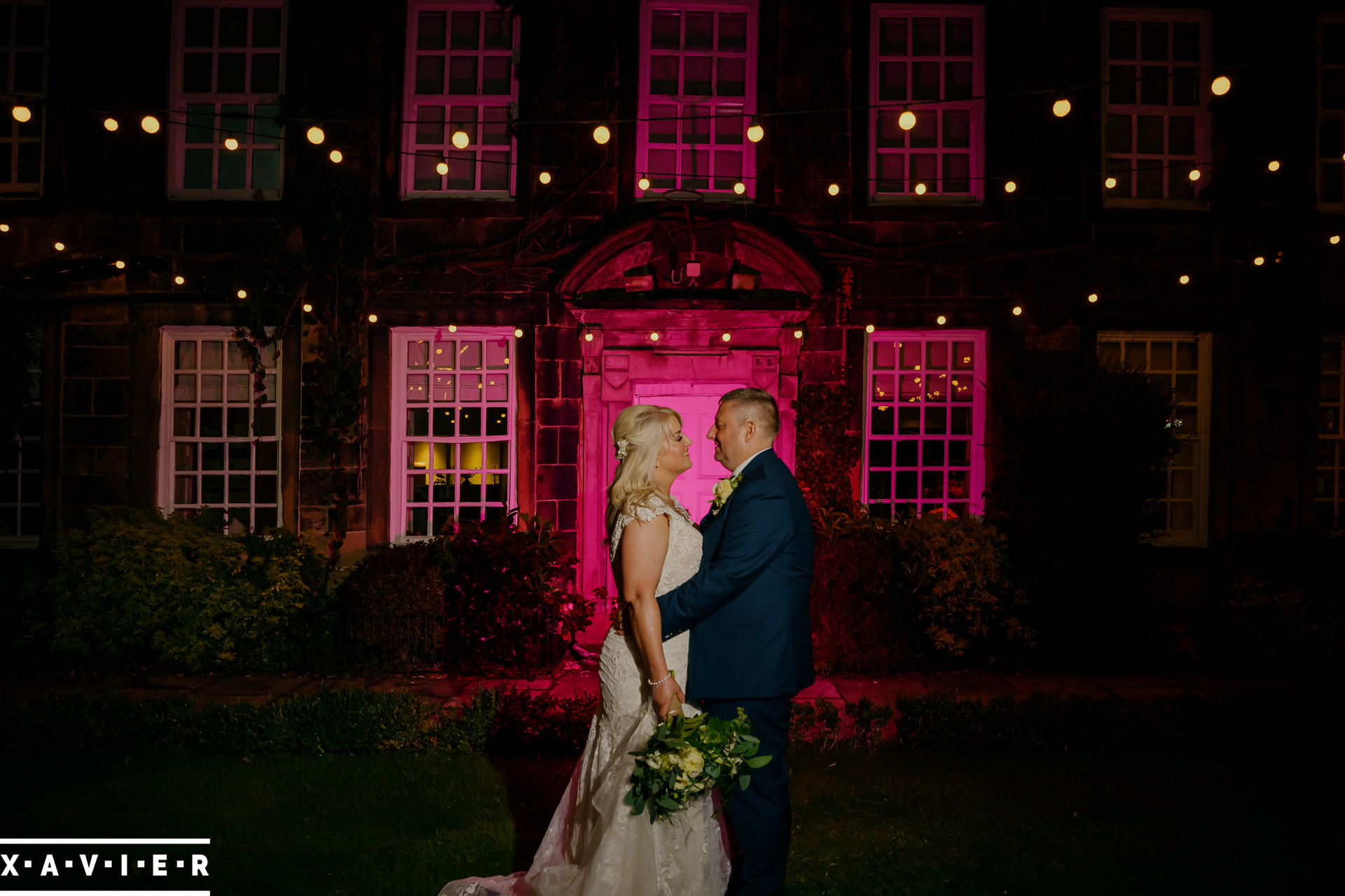 bride and groom twilight portrait