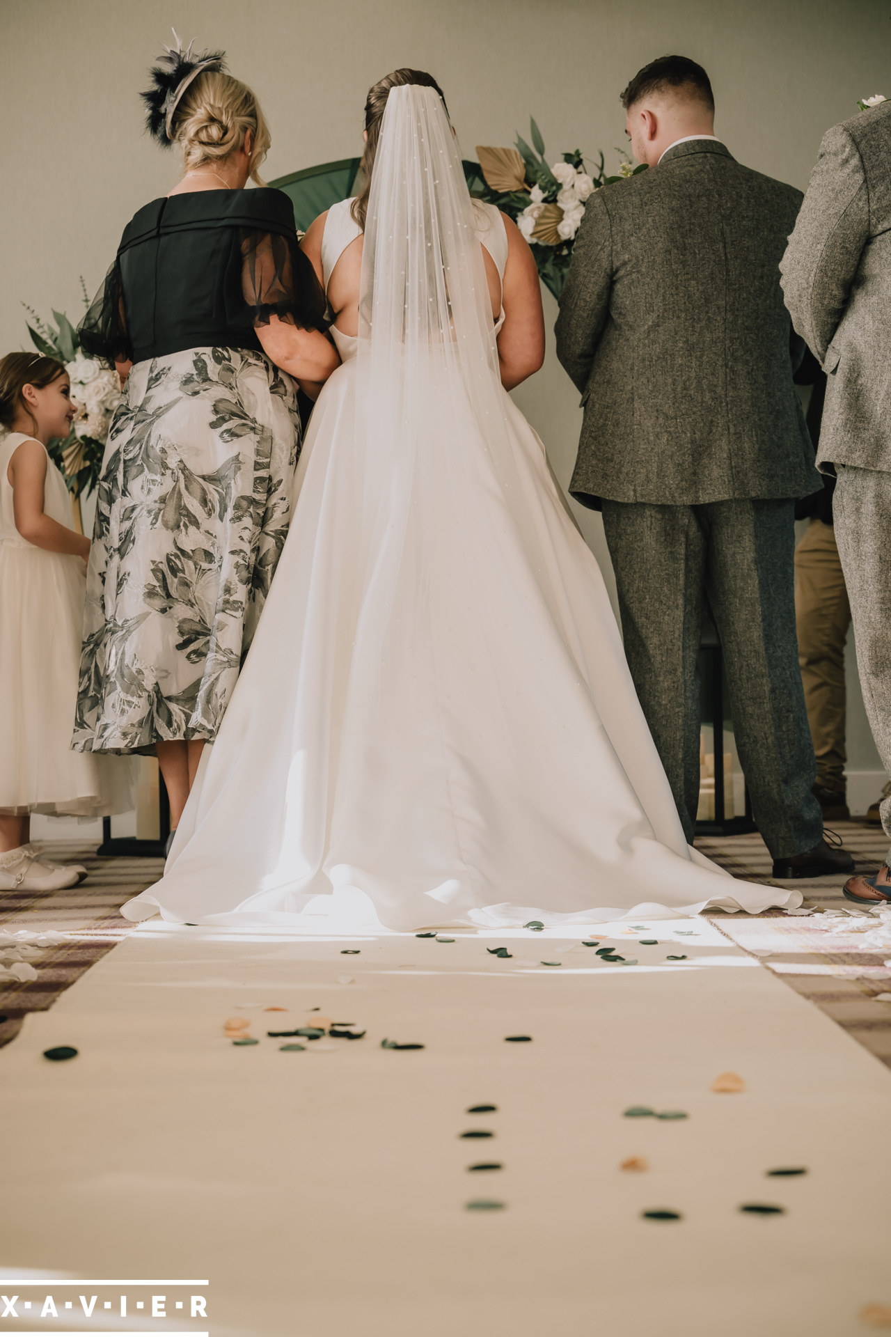 bride joins the groom at the altar