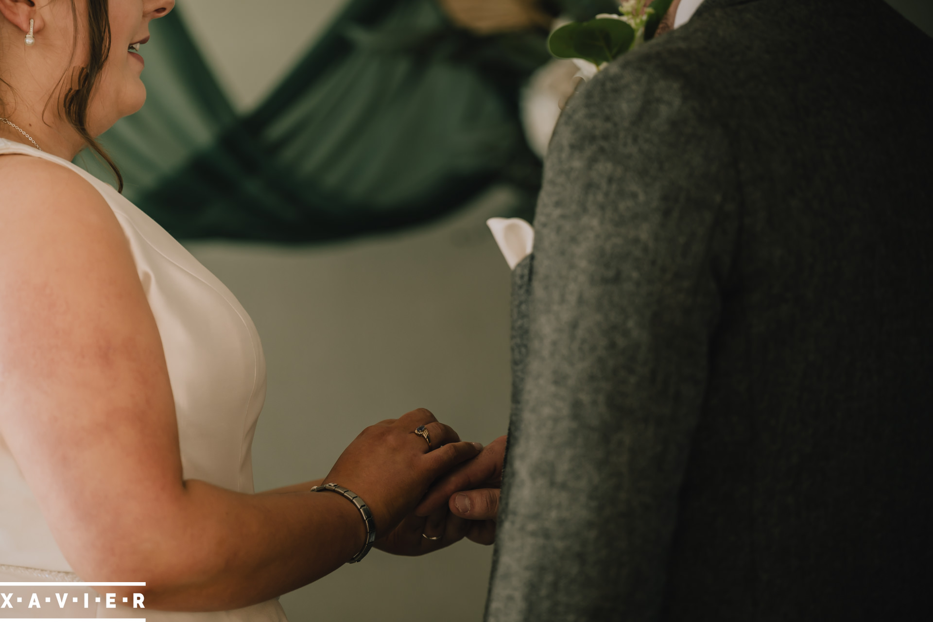Guests look on at the bride and groomduring the ceremony 