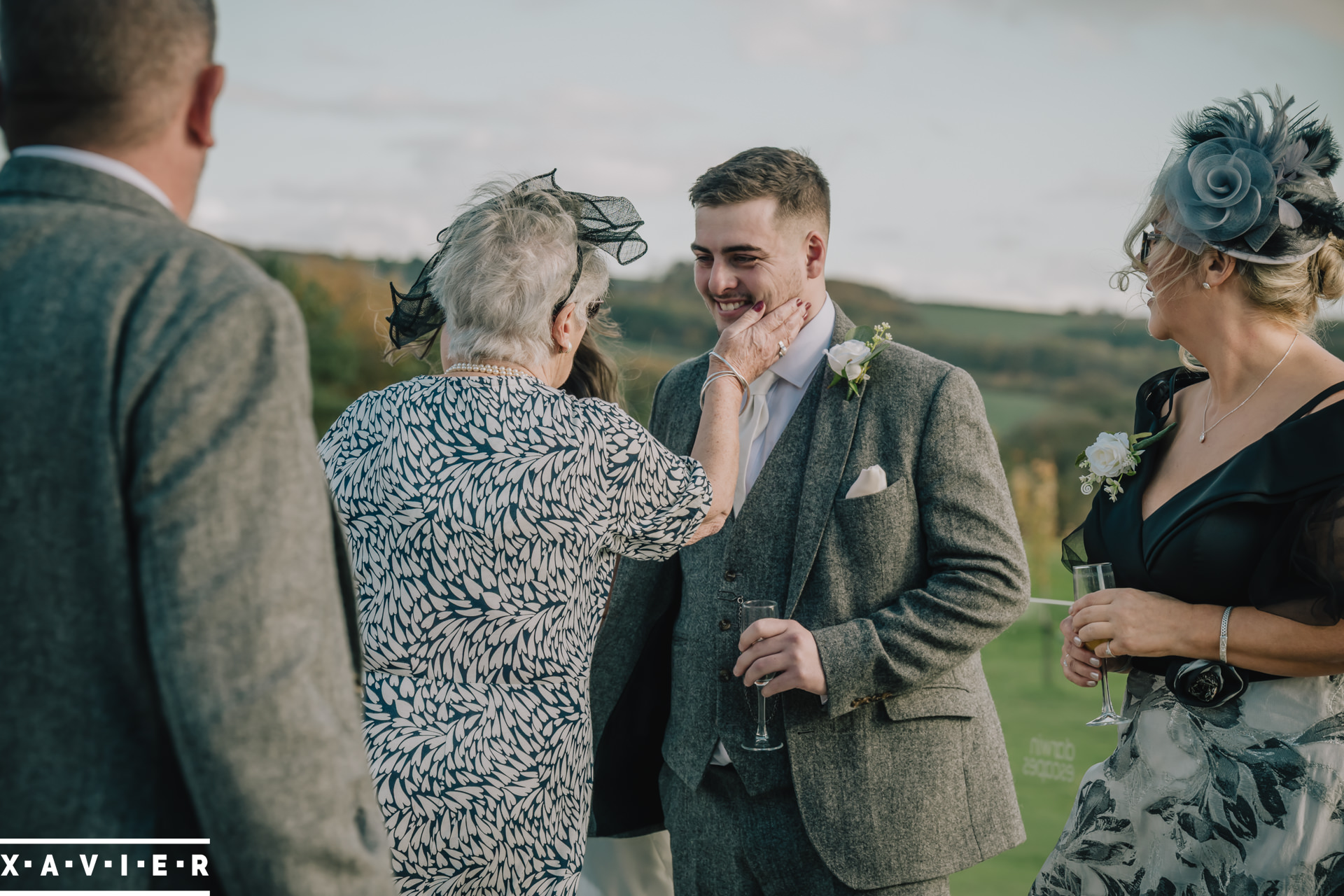 grandma welcomes the groom to the family
