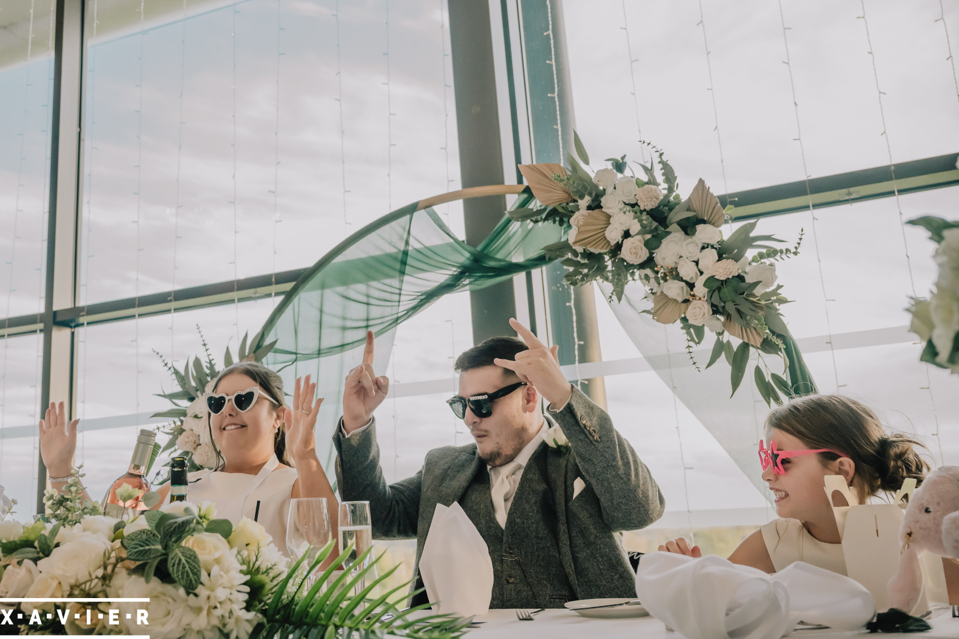 bride and groom sit at the top table