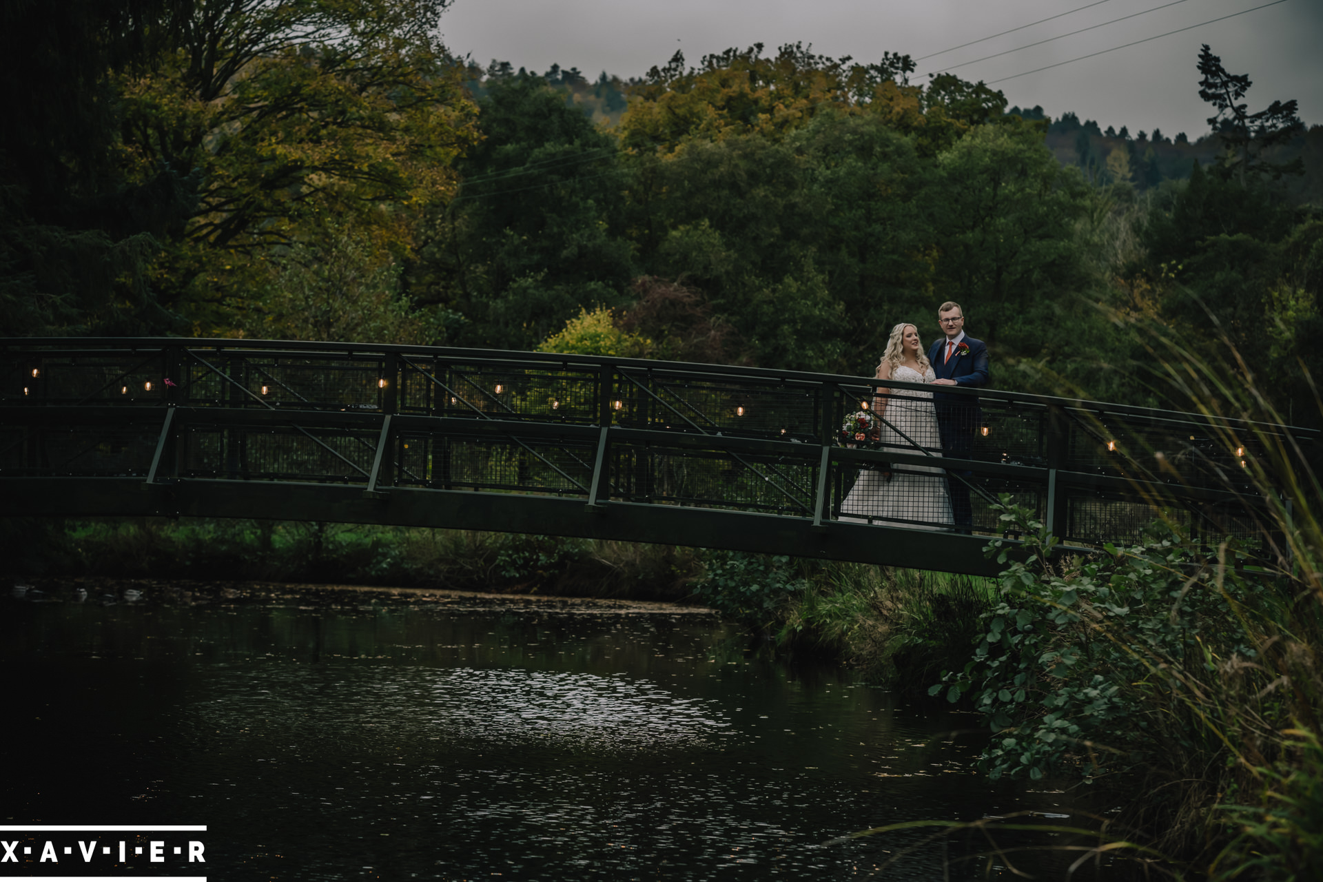 bride groom on bridge
