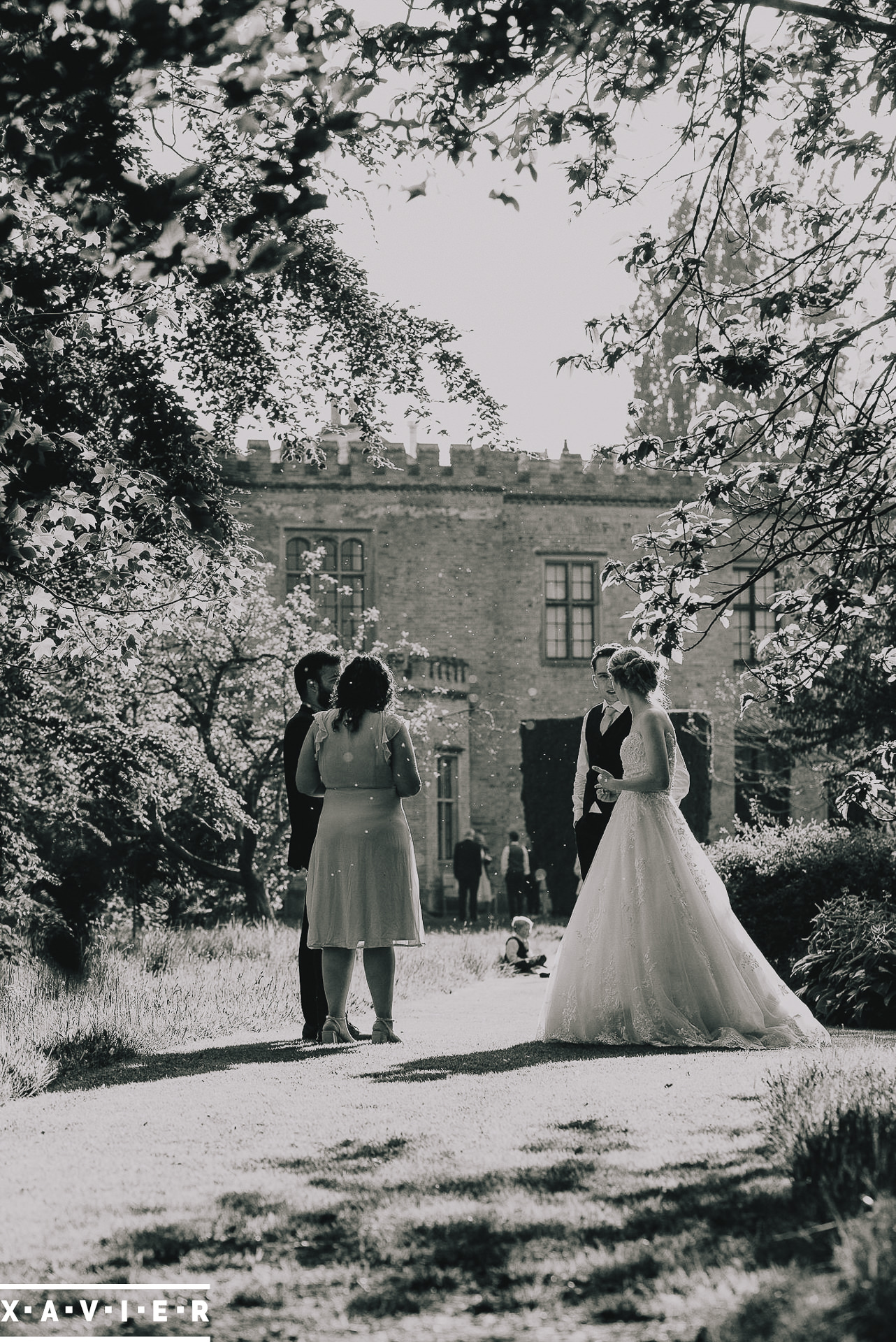 bride and groom casually chat with guests