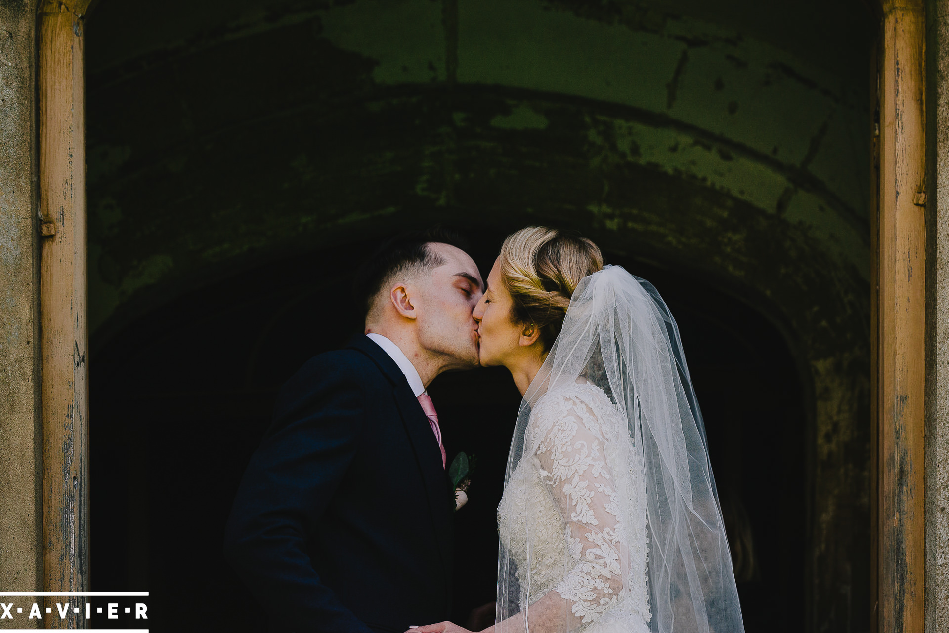 bride and grooms first kiss