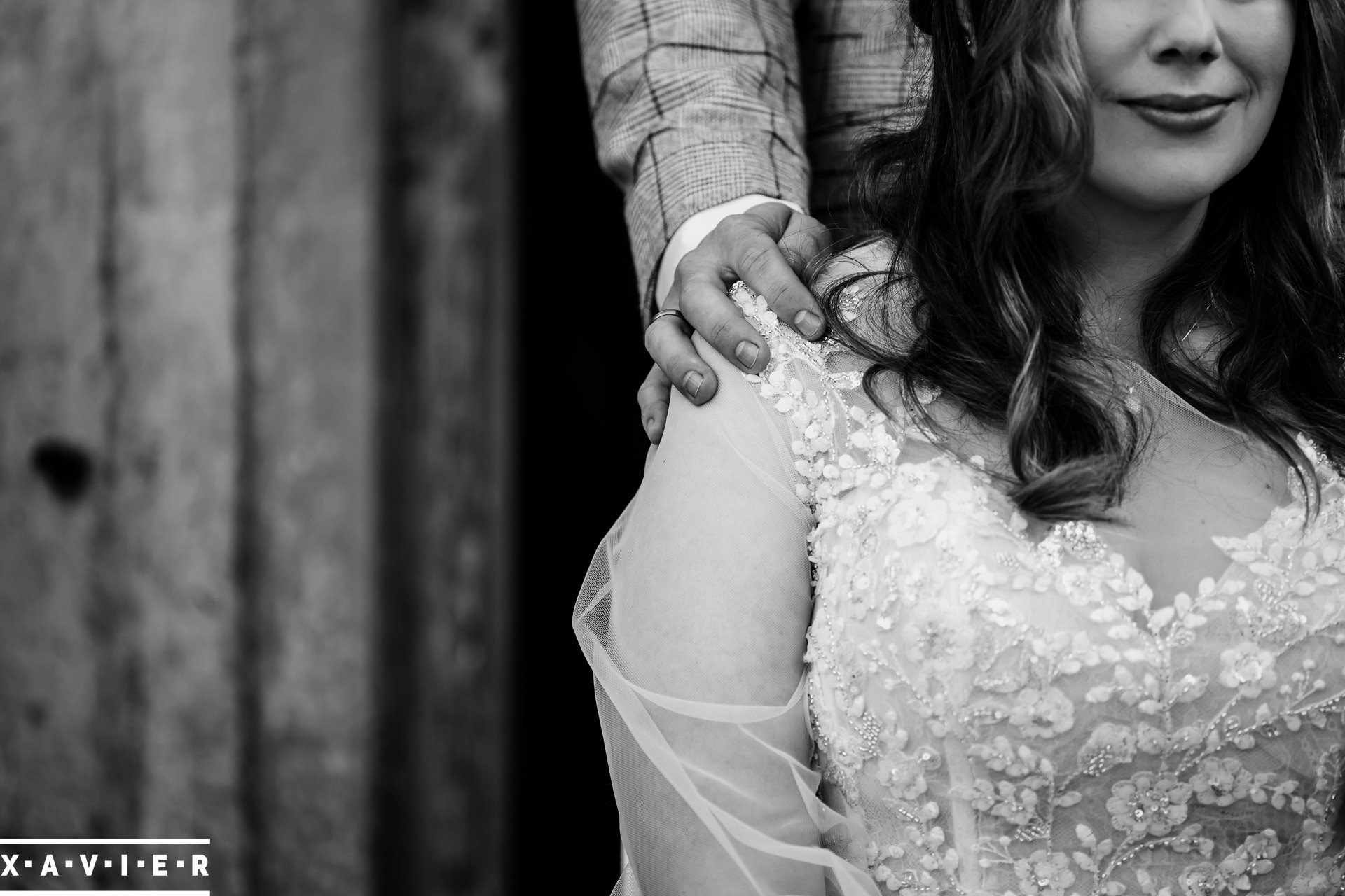 groom holds the bride