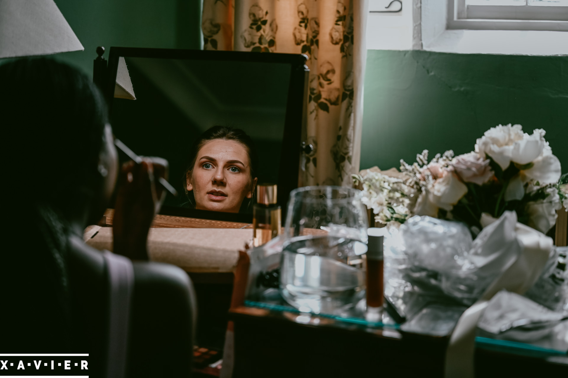 bridesmaids getting ready in the dressing room