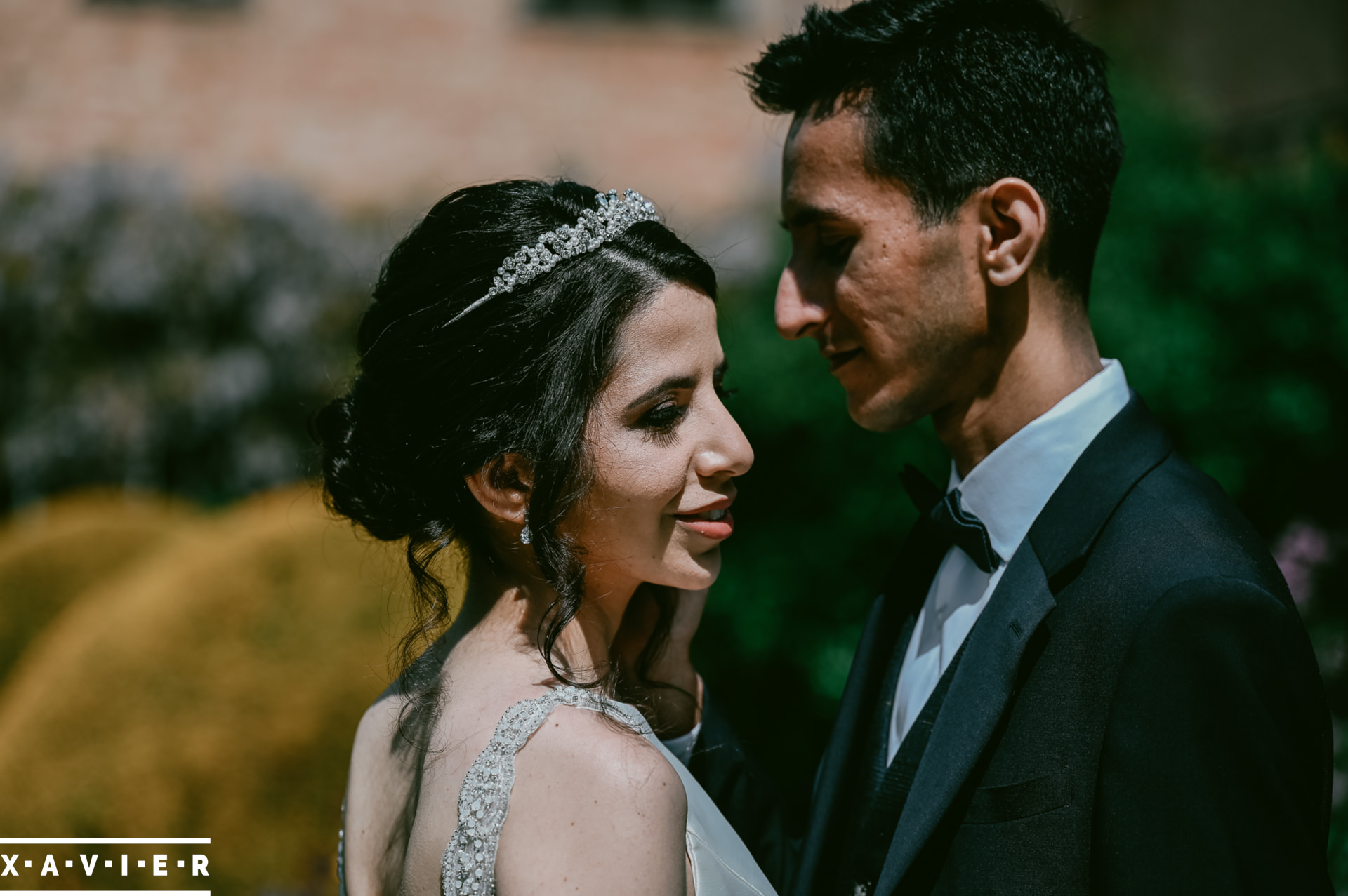 bride and groom stand together