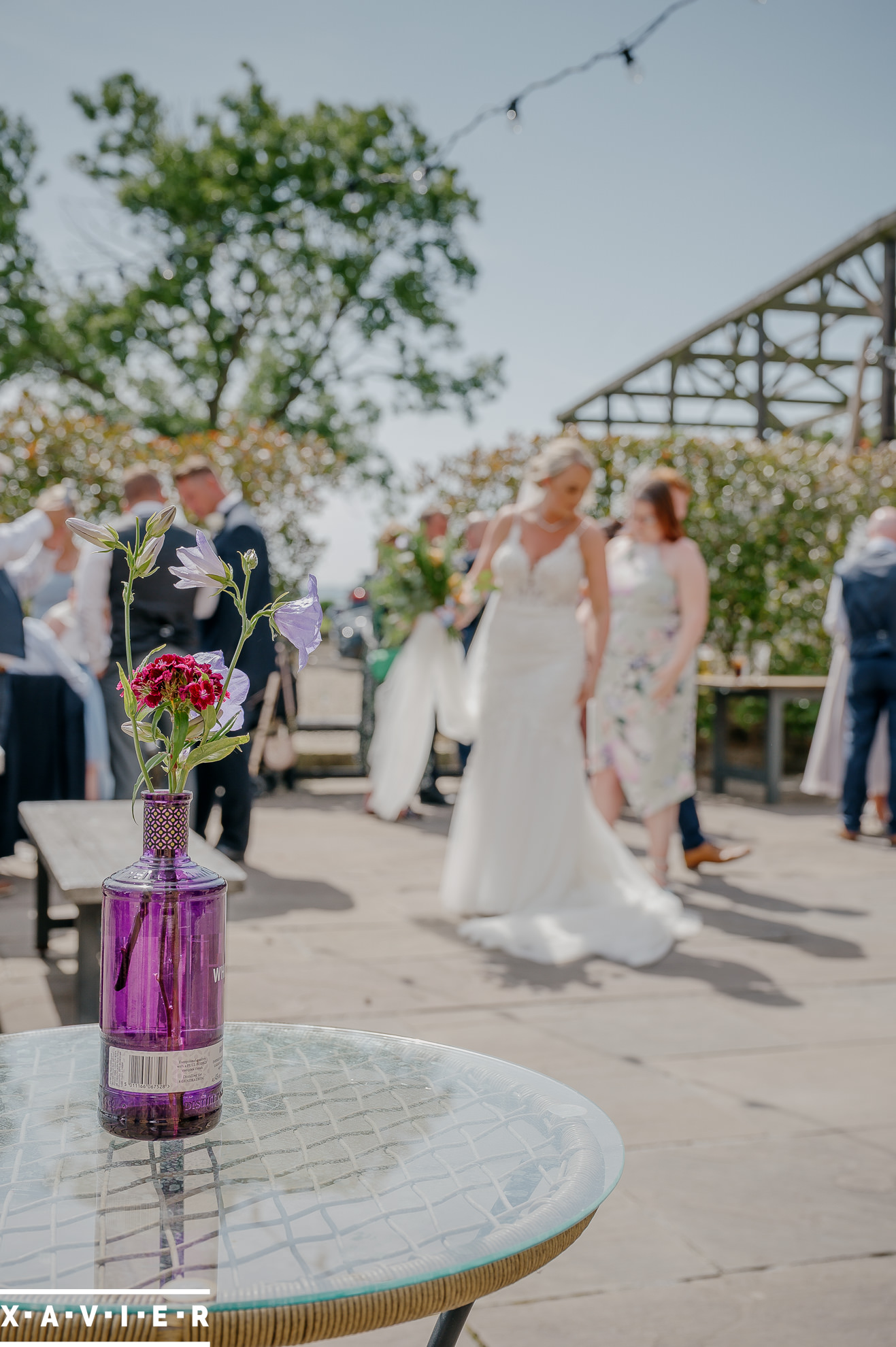 candid momnet of bride in the courtyard