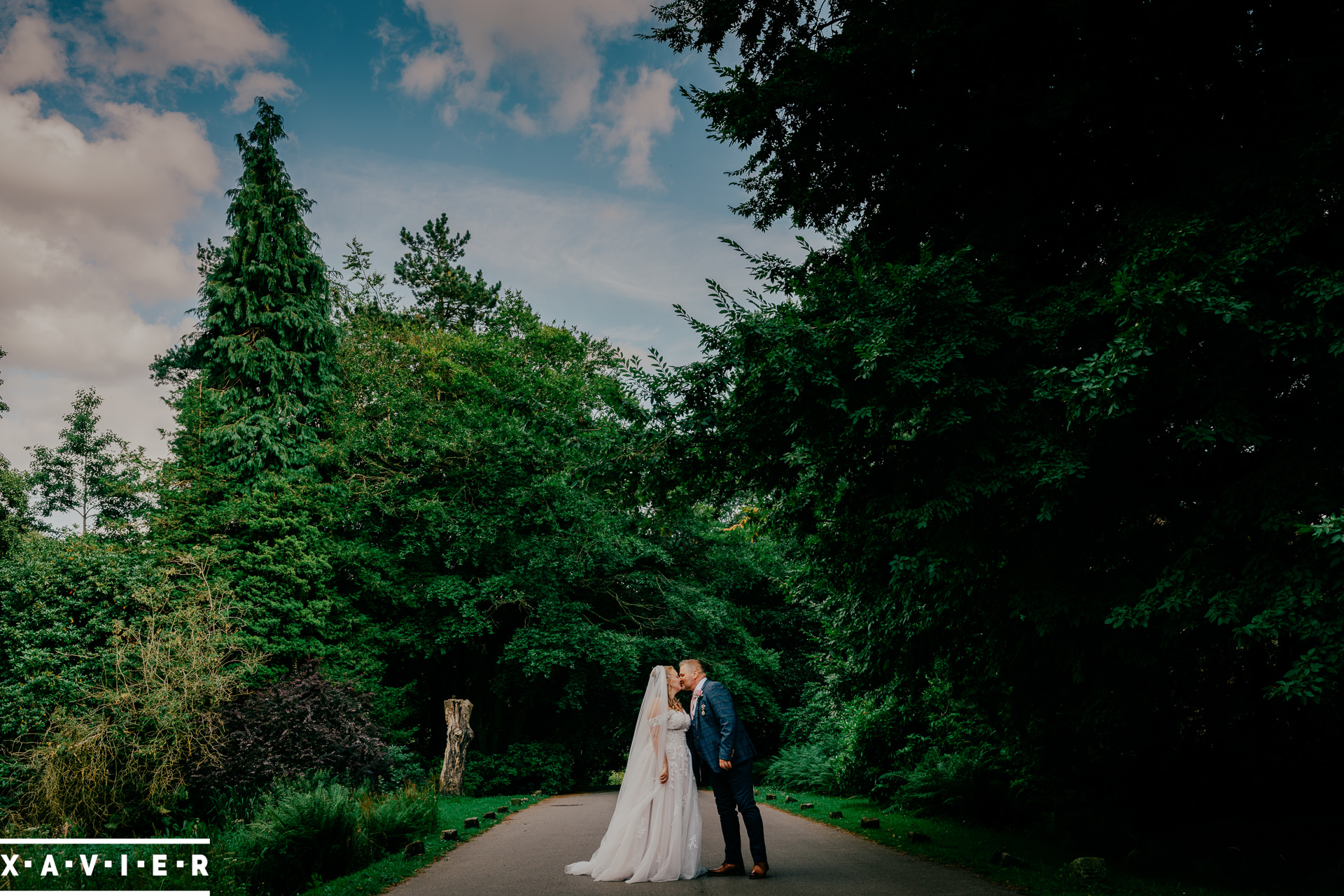 bride and groom on the path